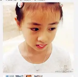 田亮女儿拔牙被疼哭梳辫子表情委屈组图